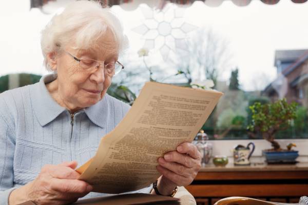 senior women reading her old training contract 2022 12 16 22 46 54 utc